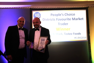 Cllr Adam Grist presents the Market Trader Award - presented to Jonathan Wilkinson-White who collected the award on behalf of Tastee Food