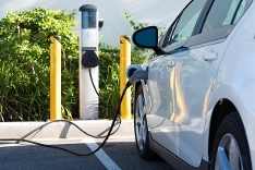 A car using a charging point to replenish charge